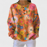 Róisín - Vibrant Orange Jumper with Colourful Floral Design
